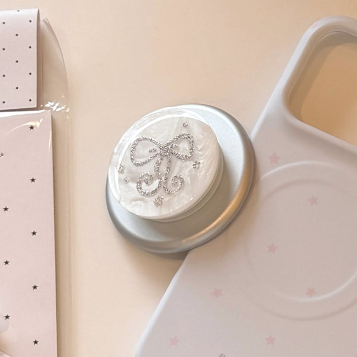 Stilvoller Smartphone Fingerhalter mit Glitzer Schleifendesign Karnz
