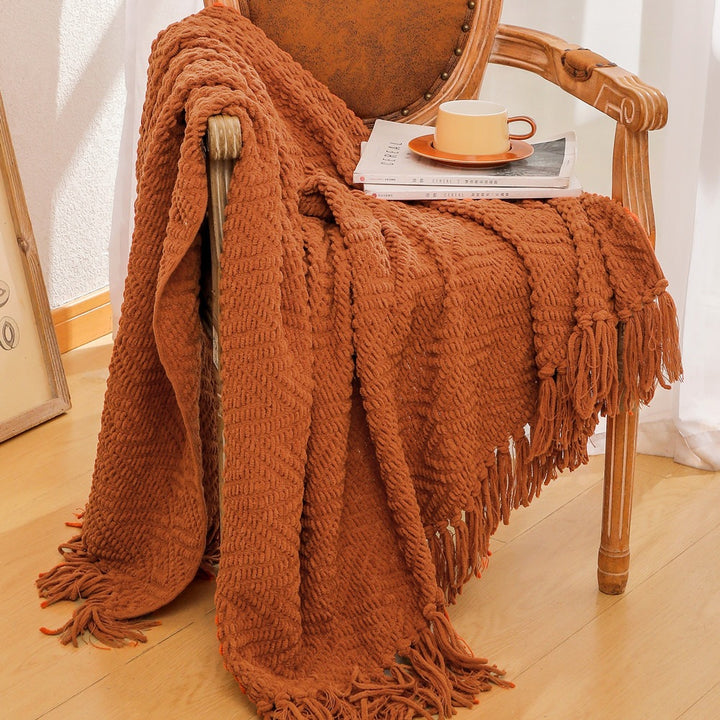Strickdecke mit Dekoration