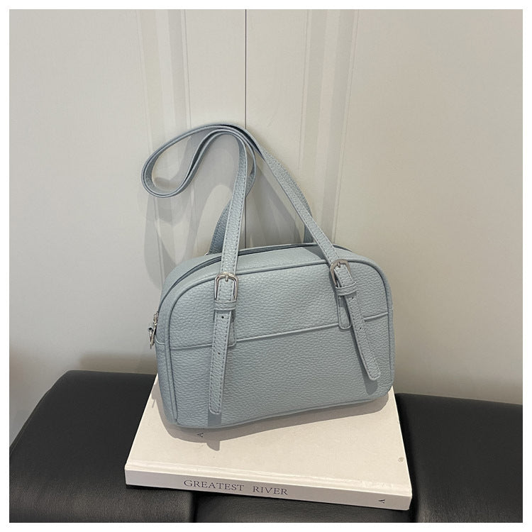 Strukturierte Handheld-Tasche