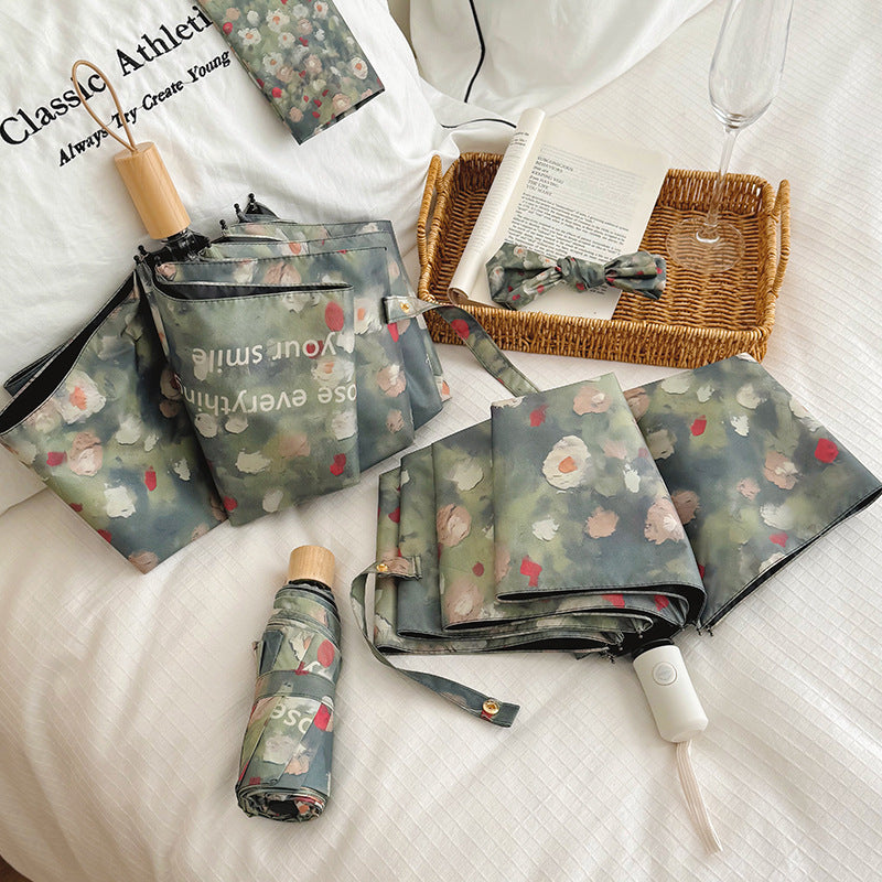 Damen Faltbarer Regenschirm mit floralem Design Karnz