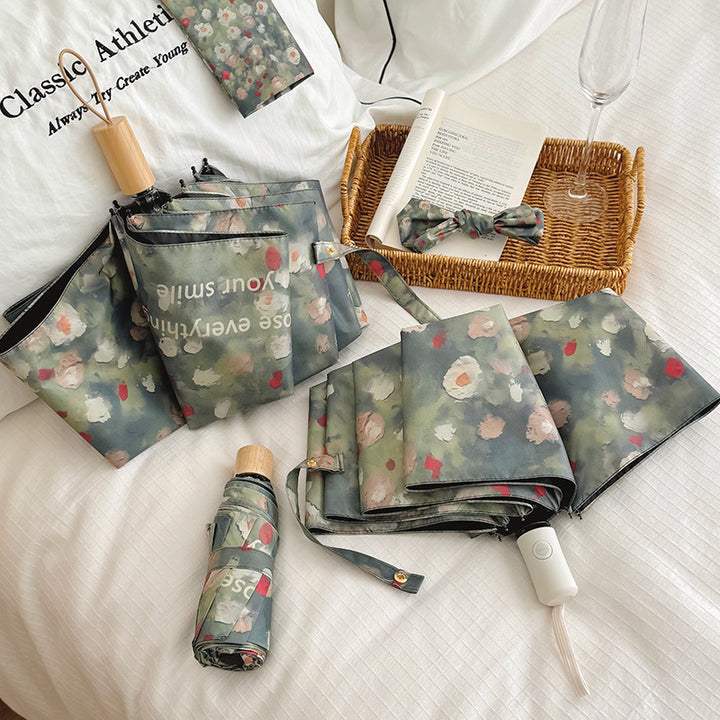 Damen Faltbarer Regenschirm mit floralem Design Karnz