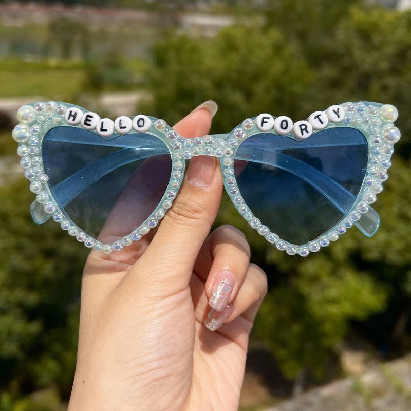 Perlenverzierte Cat-Eye-Sonnenbrille Karnz