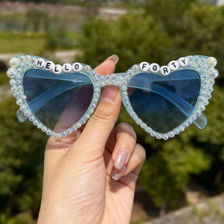 Perlenverzierte Cat-Eye-Sonnenbrille Karnz
