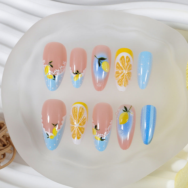 Kunstnagelset mit fröhlichen Zitrus- und Blumenmotiven Karnz