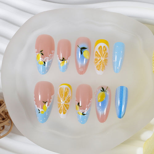 Kunstnagelset mit fröhlichen Zitrus- und Blumenmotiven Karnz