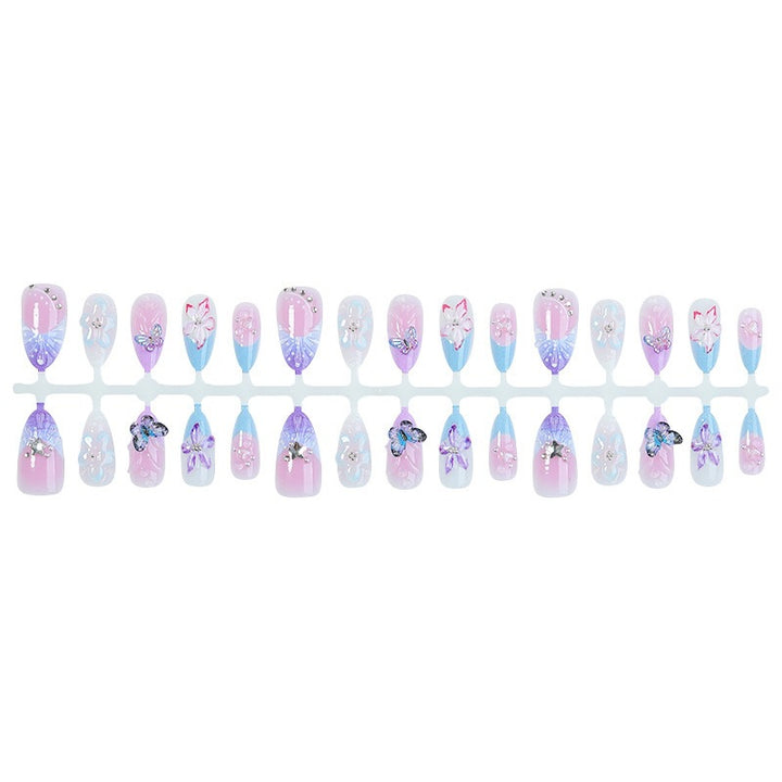 Künstliches Nagelset mit floralen und Glitzerdetails Karnz