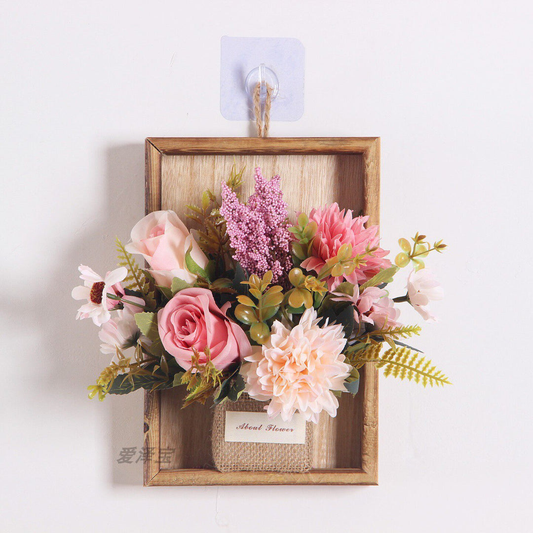 Wandmontierte dekorative florale hängende Pflanzgefäß