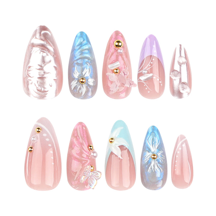 Kunstvolle Stiletto-Nägel mit zarten Blumen- und Glitzerverzierungen Karnz