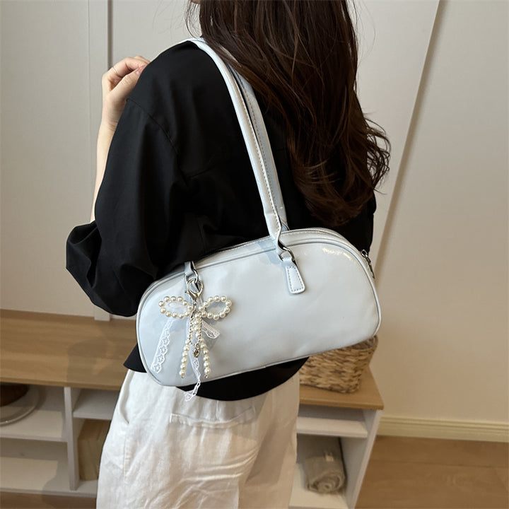 Leder Handtasche mit Patentoberfläche