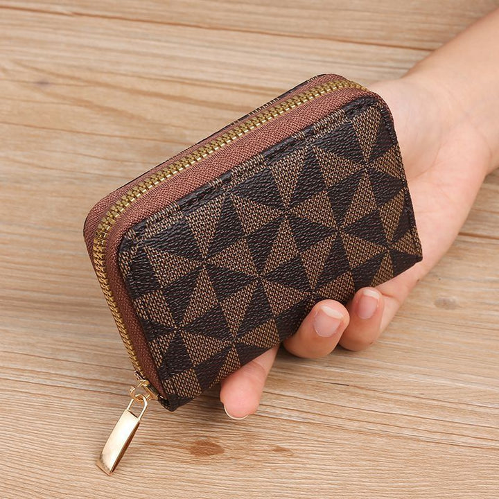 Geometrisch gemusterte Reißverschluss-Münztasche Karnz