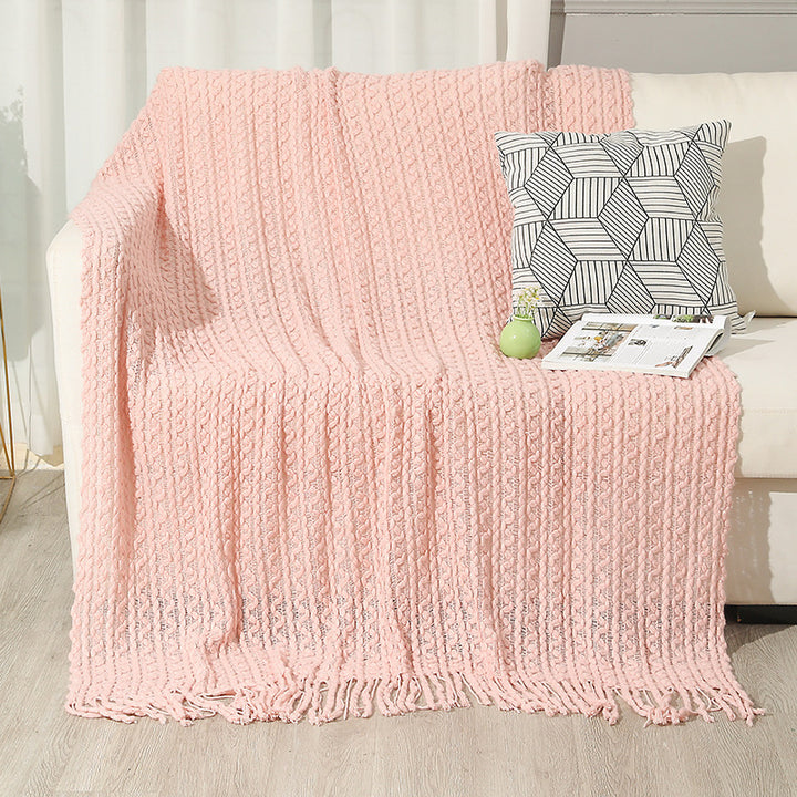 Strukturierte Strickwurfdecke