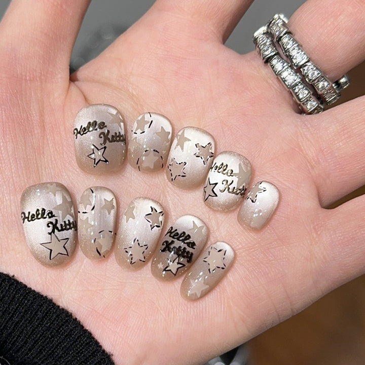 Künstliche Nagelspitzen mit Hello Kitty-Design Karnz