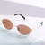 Damen designorientierte modische Sonnenbrille Karnz