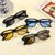 Damen moderne rechteckige Sonnenbrille mit farbigen Gläsern Karnz