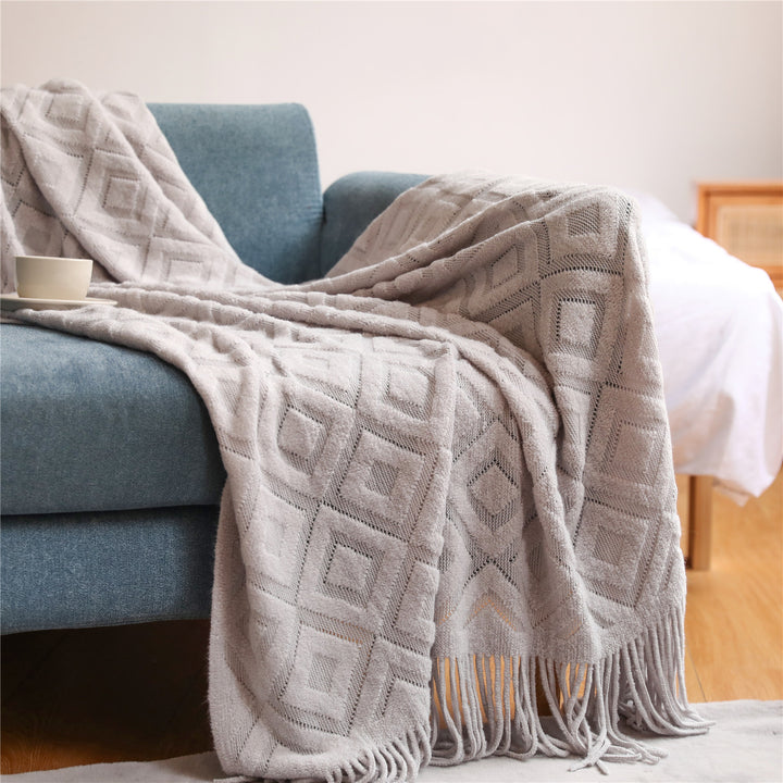 Gemütliche Strickwurfdecke