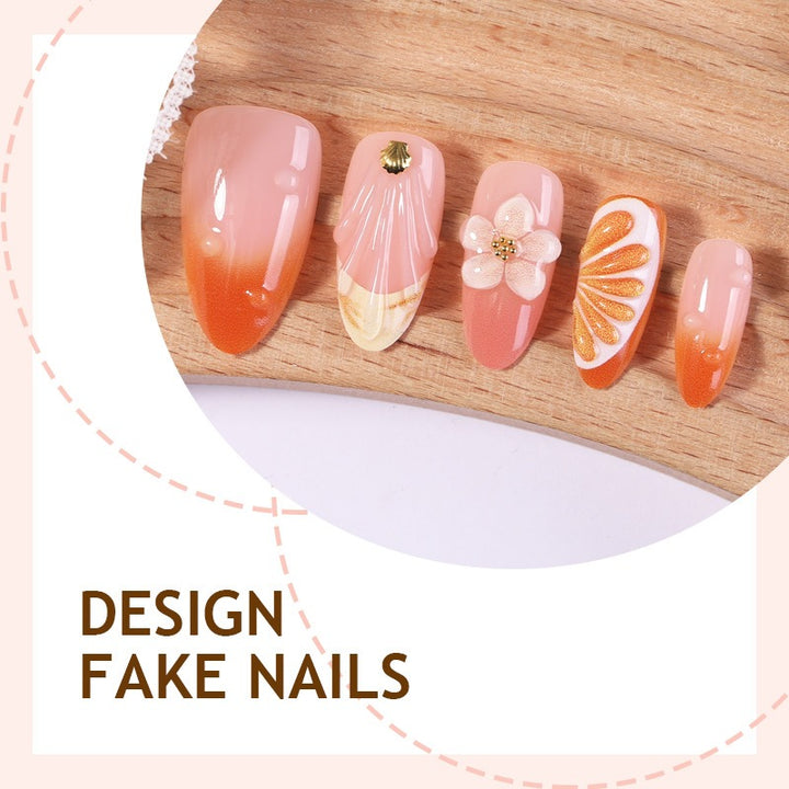 Kreatives Nagelset mit Blumen- und Fruchtverzierungen Karnz