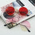 Damen runde Sonnenbrille mit stylischem Metallic-Rahmen Karnz