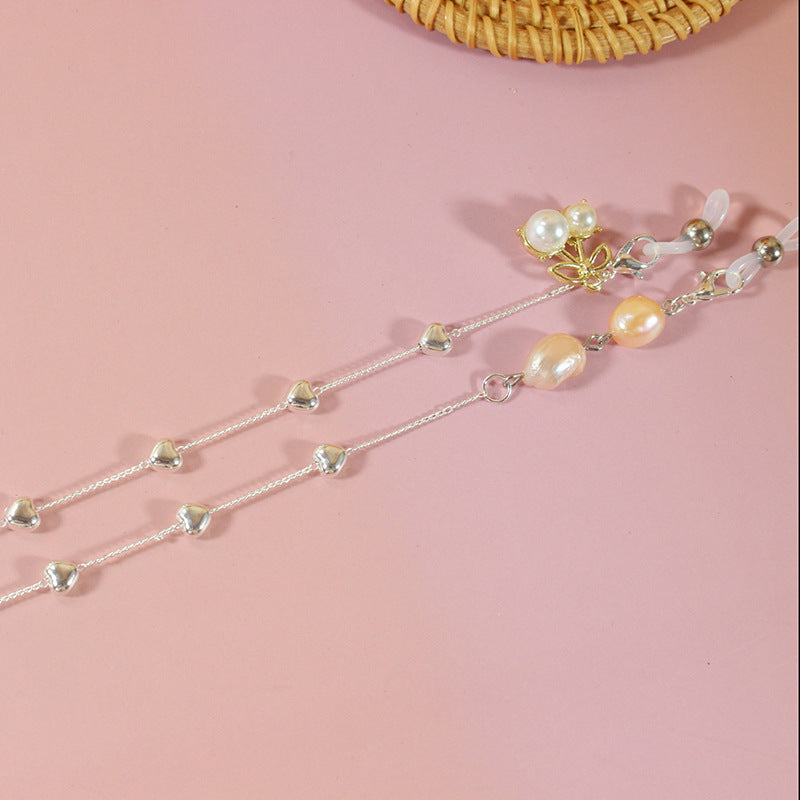 Elegantes Schmuckband mit Perlen und Silbernen Akzenten Karnz