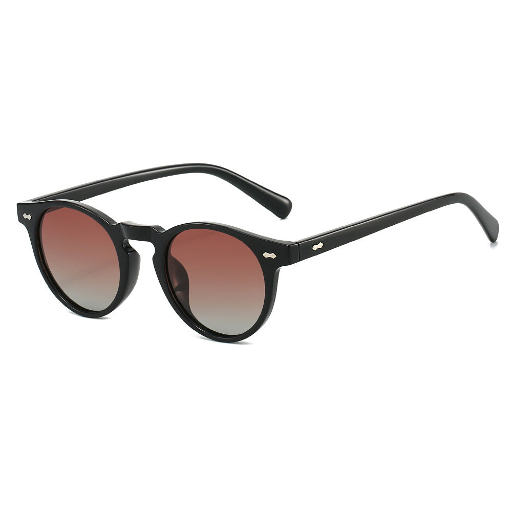 Damen Vintage Sonnenbrille mit runden Gläsern und transparentem Rahmen Karnz