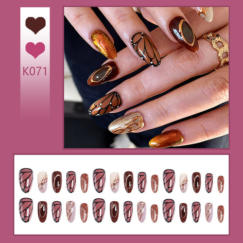 Kunstnagelset mit elegantem Gold- und Schwarzdesign Karnz