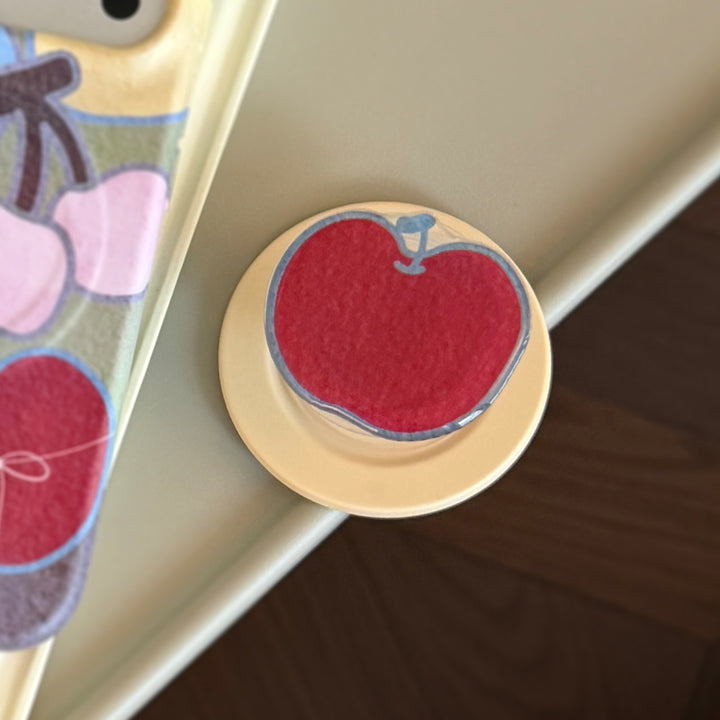 Smartphone Fingerhalter im Apfelmotiv Karnz