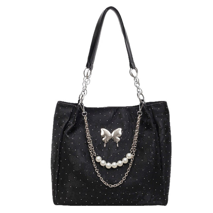 Elegante Handtasche mit Perlendetails Karnz