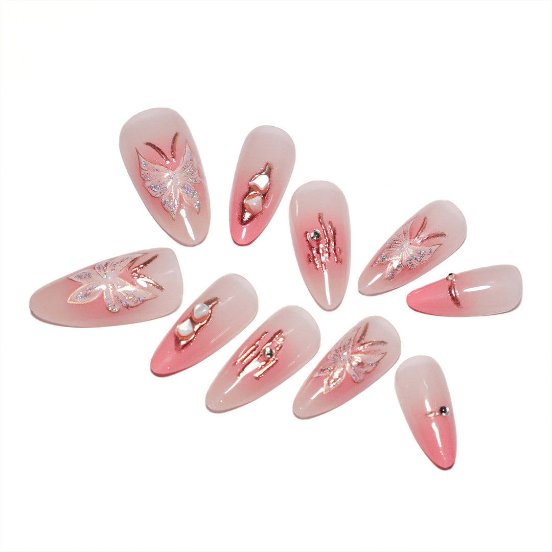 Künstliche Nagelverlängerungen mit floralen Motiven und Glitzerakzenten Karnz
