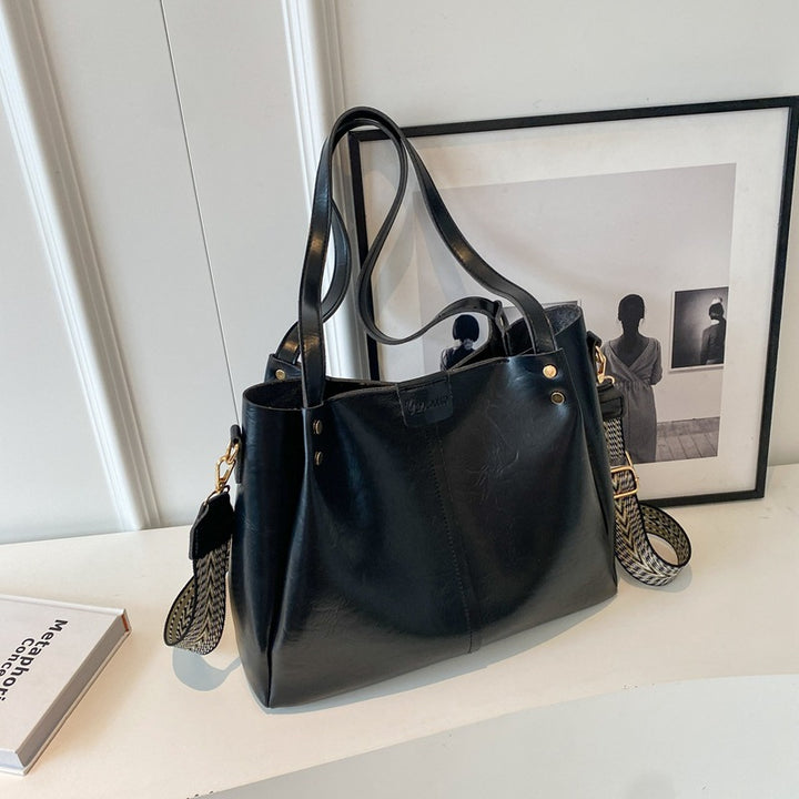 Vielseitige multifunktionale Handtasche Karnz