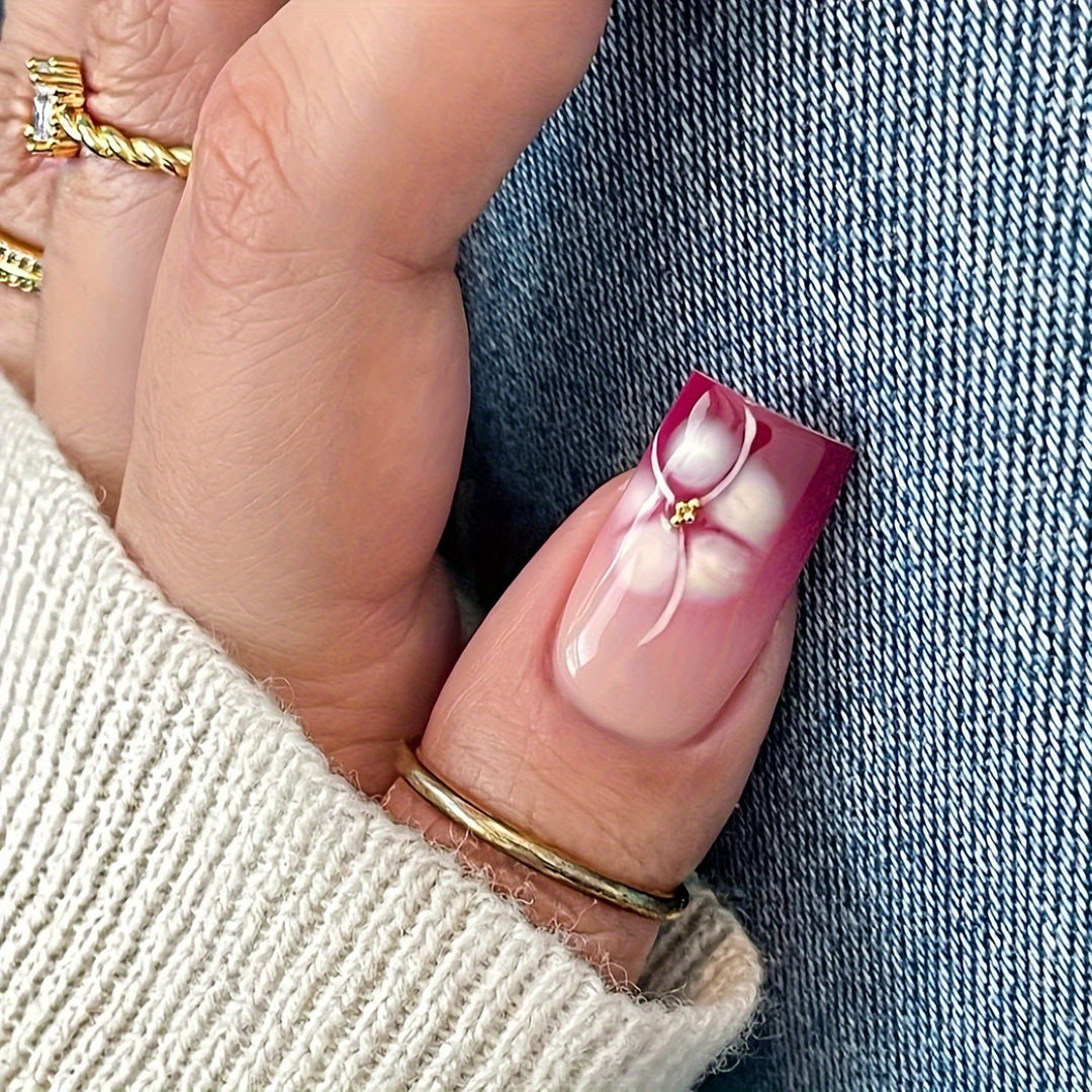 Künstlerische Gel-Nagelverlängerungen mit floralem Design Karnz