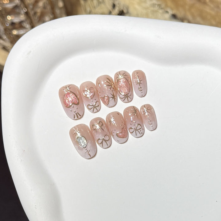 Dekorativer Press-On Nail Art Set mit Herz- und Glitzerakzenten Karnz