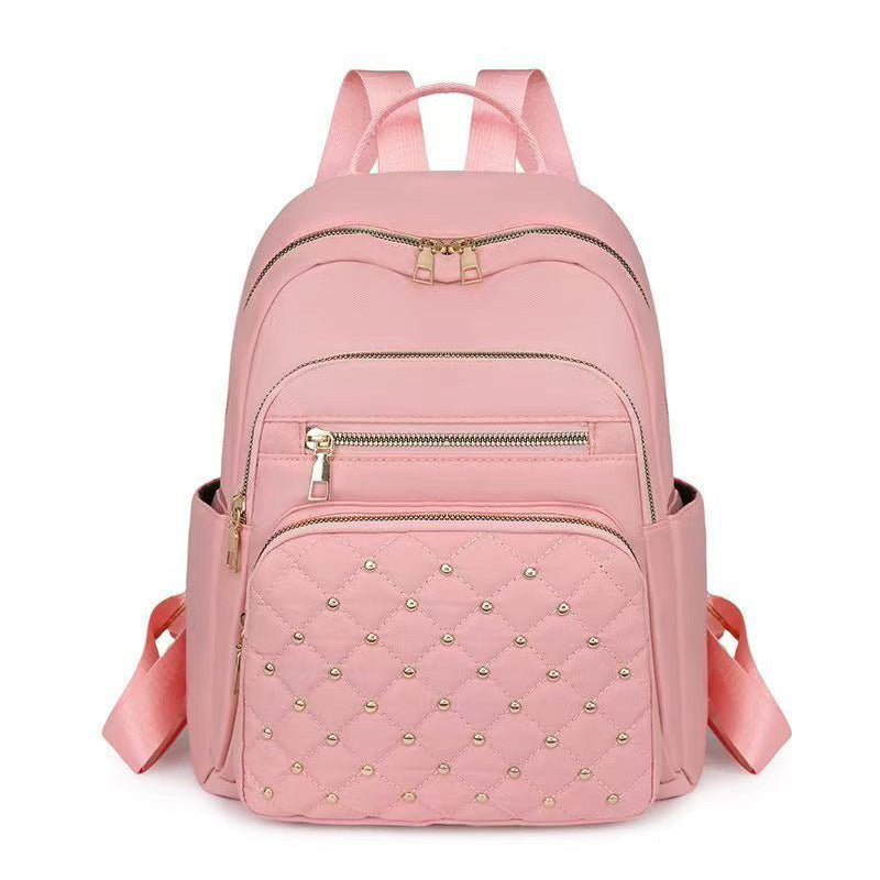 Damen gesteppter Rucksack mit dekorativen Nieten Karnz