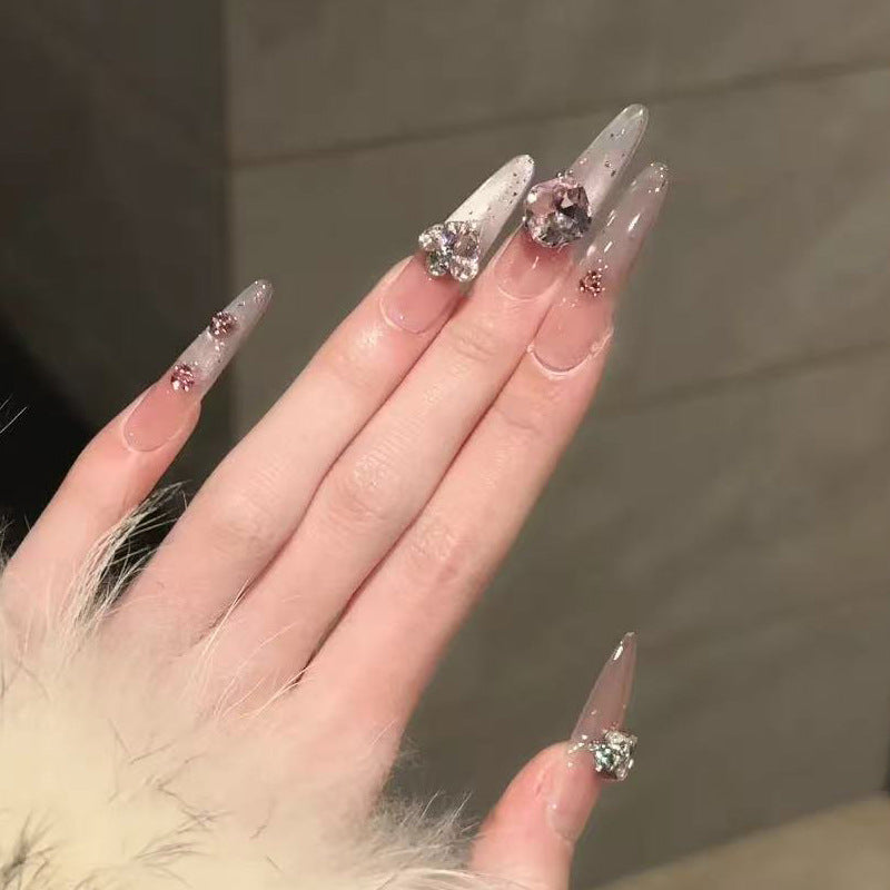 Dekoratives Lange Stiletto Press-On Nagelset mit Strassakzenten Karnz