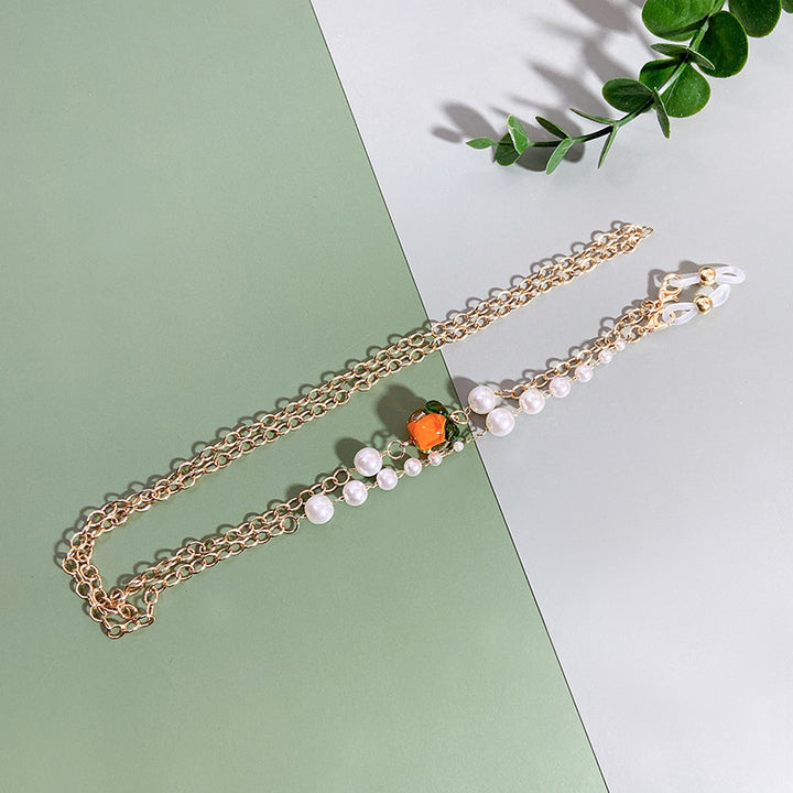 Elegante Kette mit Perlen und Rubinen Karnz