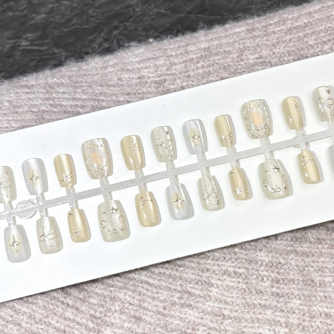 Künstlerisches Press-On Nagelset mit elegantem Stern Design