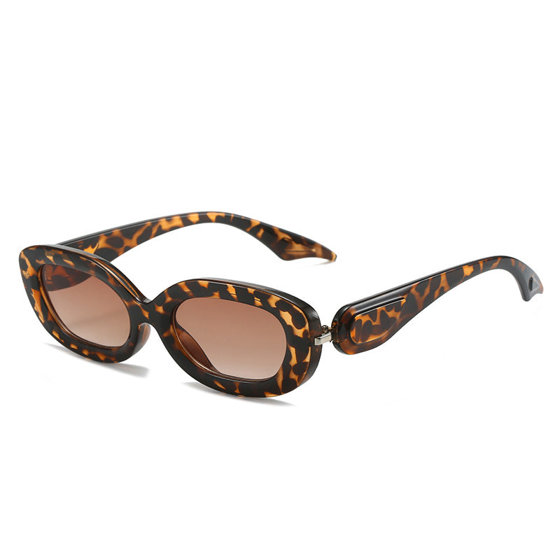 Damen modische Sonnenbrille mit stilvollem, geschwungenem Rahmen Karnz