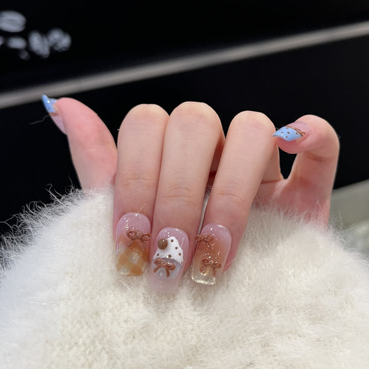 Dekoratives Press-On Nagelkunst Set mit charmanten Schleifenakzenten Karnz
