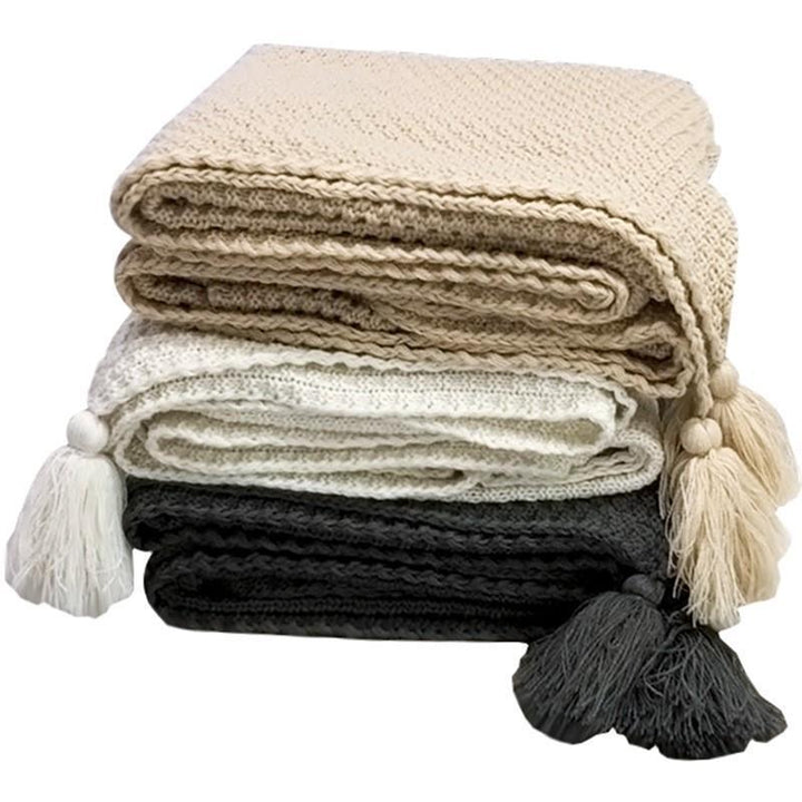 Strukturierte Strickwurfdecke