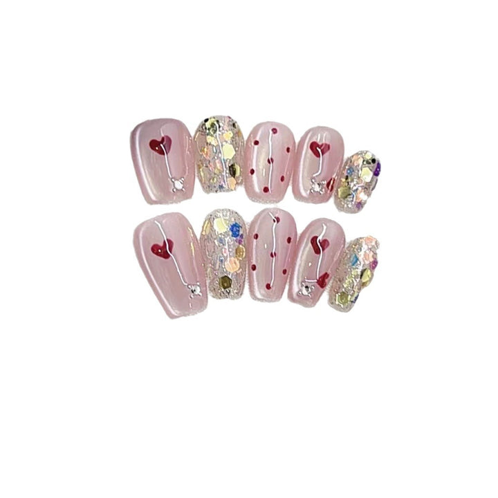 Dekoratives Press-On Nagelkunst Set mit Herz- und Glitzerdesigns Karnz