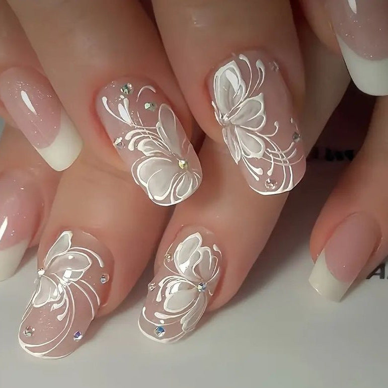 Elegante Blumendesign Nagelkunstveredelungen Karnz