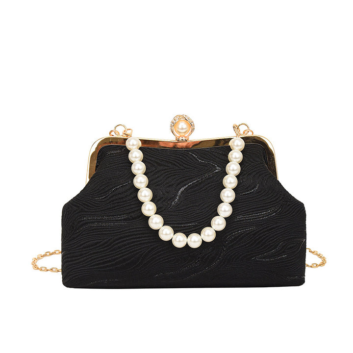 Elegante perlenverzierte Abendhandtasche