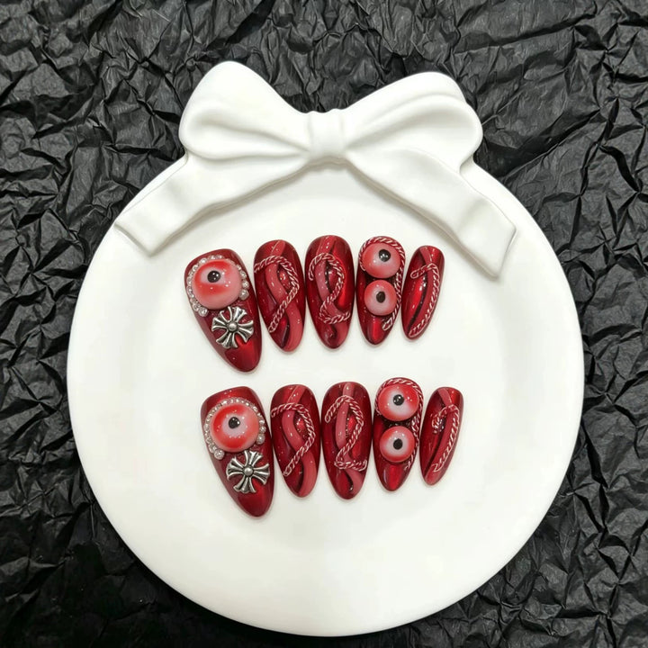 Künstlerisches Press-On Nagelkunst Set mit einzigartigen roten Designs