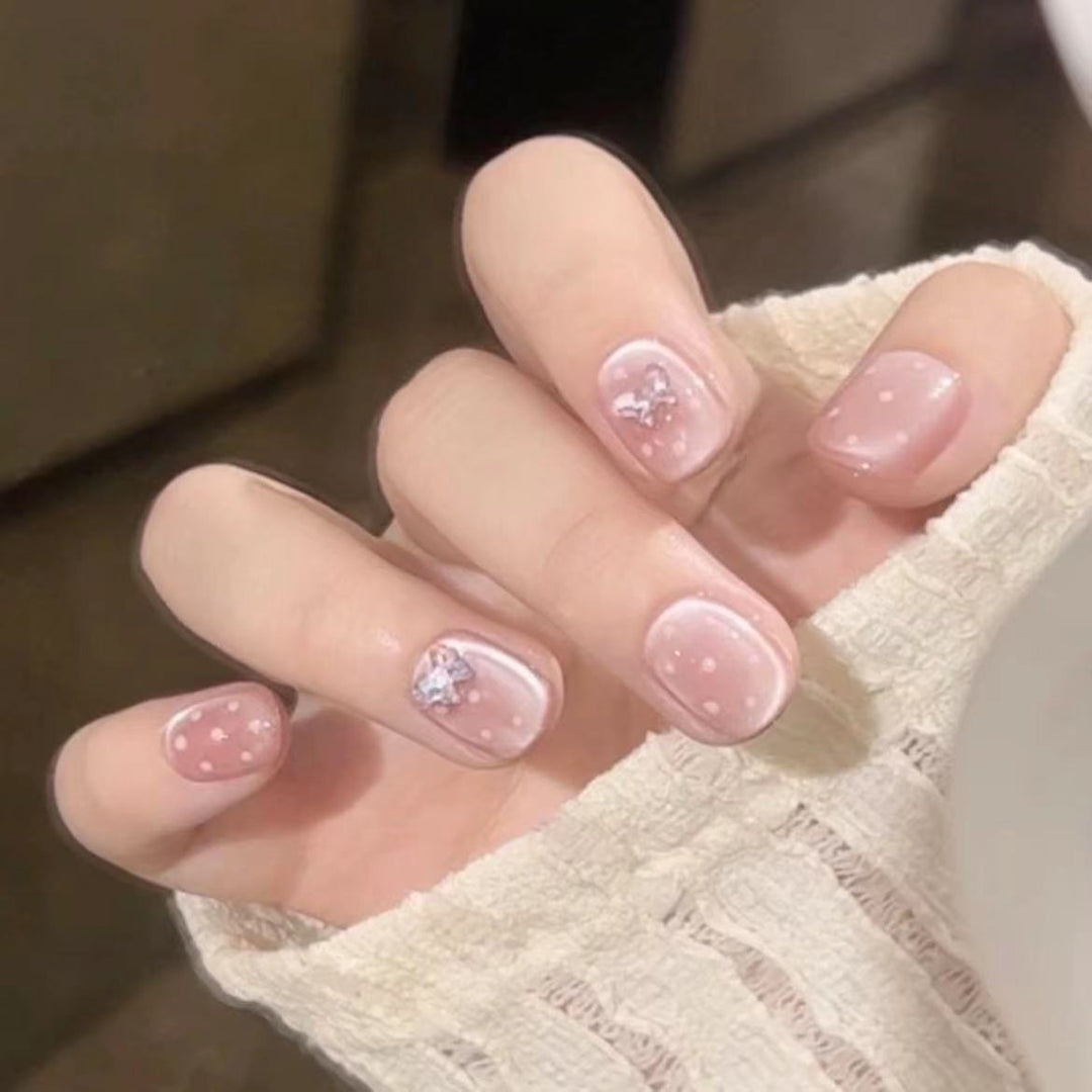 Künstlerisches Blumen Press-On Nagelset mit Glitzerakzenten Karnz