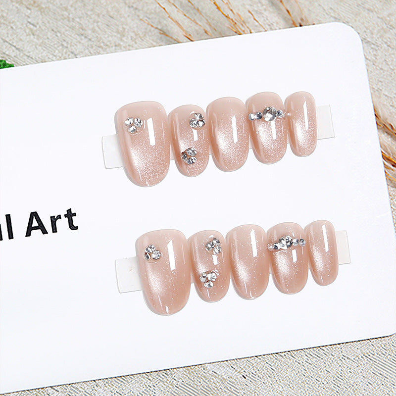 Kunstnagelset mit eleganten Strassverzierungen Karnz