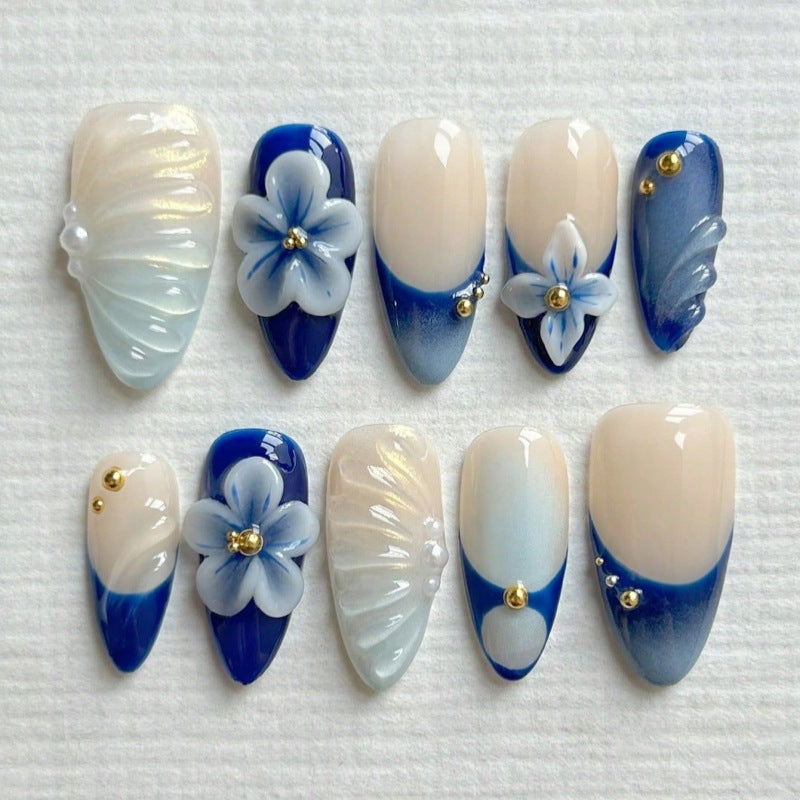 Künstlerisches Floral- und Stern-Applikationen Press-On Nagelset Karnz