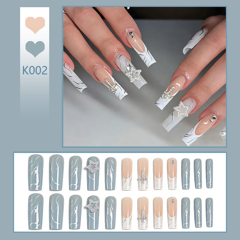 Kunstnägel mit luxuriösem Marmor-Design und strahlenden Verzierungen Karnz