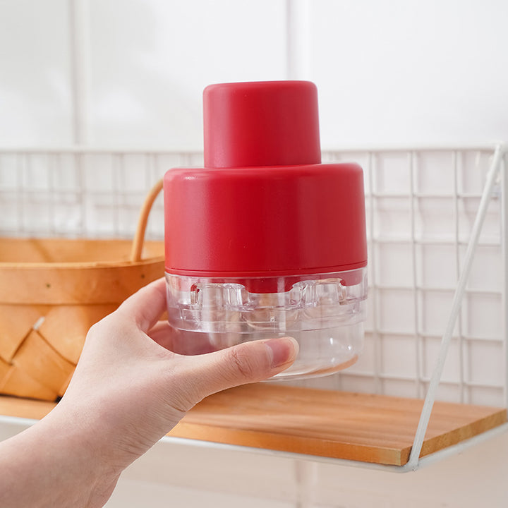 Push‑Down Herb and Garlic Chopper with Built‑In Stainless Blades