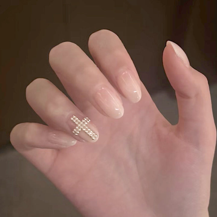 Elegante Press-On-Nagelkunst mit Kreuzdesign Karnz