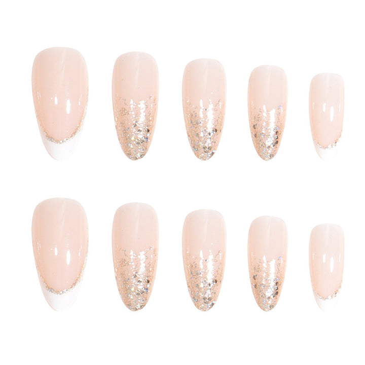 Elegantes Stiletto Press-On Nail Set mit Glitzer und französischer Spitze Karnz