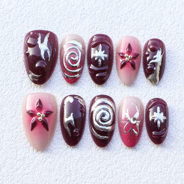 Luxuriöse dekorative Press-On-Nägel mit eleganten Designs
