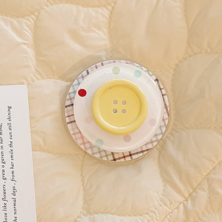 Dekorativer Untersetzer im Button-Design Karnz